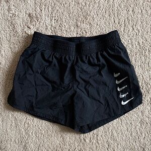 Nike Women's Black Athletic Shorts with Silver Logo